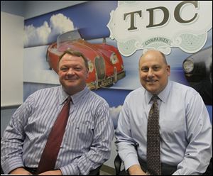 Cleves R. Delp, chairman and chief executive officer of TDC Cos., left, and Jim Schwarzkopf, principal of TDC Risk Management, gather at the company’s headquarters in Maumee.