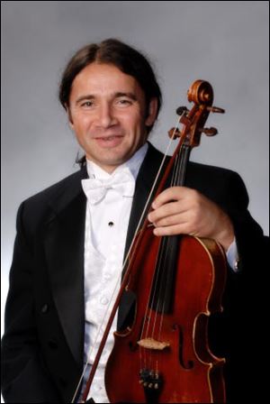  Valentin Ragusitu, violist for the TSO.