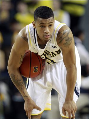 Michigan guard Trey Burke, the sophomore point guard who led Michigan to the Final Four, was selected Thursday as The Associated Press' college basketball player of the year.