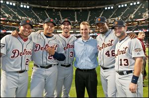 Brian Britten is flanked by Detroit Tigers players, from left, Jhonny Peralta, Miguel Cabrera, Justin Verlander, Jose Valverde, and Alex Avila at the 2011 All-Star Game. The Perrysburg High graduate be­gan work­ing for the team’s me­dia re­la­tions department in 2000; now, he is the di­rec­tor.