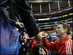  Louisville head coach Rick Pitino greets fans today after practice for their NCAA Final Four tournament college basketball semifinal game against Wichita State in Atlanta.