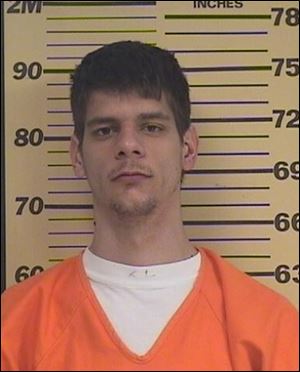 Kyle Kovac is being held in jail on multiple charges after returning with weapons to his former workplace.