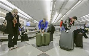 Travelers check luggage at a United Airlines baggage claim area at O'Hare International Airport in Chicago. United Airlines had the highest consumer complaint rate of the 14 airlines in a report being released today: 4.24 complaints per 100,000 passengers. 