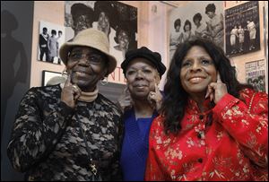 The Andantes, the unsung backing group which sang on thousands of Motown songs, from left, Jackie Hicks, Marlene Barrow-Tate, and Louvain Demps, pose during a visit to the Motown Historical Museum in Detroit.