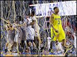  Michigan’s Trey Burke walks off the court after Monday’s loss.