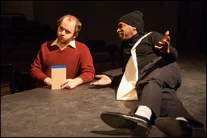 William Toth of Toledo (left) and Kenneth Taylor of Toledo rehearse a scene from Owens' upcoming 
