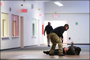 The ‘responding’ officer in a scenario approaches a ‘supposed’ victim to assess his injuries and ask what information the victim can give the officer about the whereabouts of the shooter.