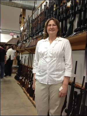 A different view on gun control comes from DeeDee Liedel, manager of Cleland’s Outdoor World, a family-owned gun and knife store and indoor range in Monclova Township.