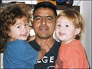 Moments like this one in which Marcos Perez enjoys time with sons  Ignacio Pele Perez, left, and Marcos Antonio Perez are now rare. Mr. Perez was deported to Mexico three years ago.