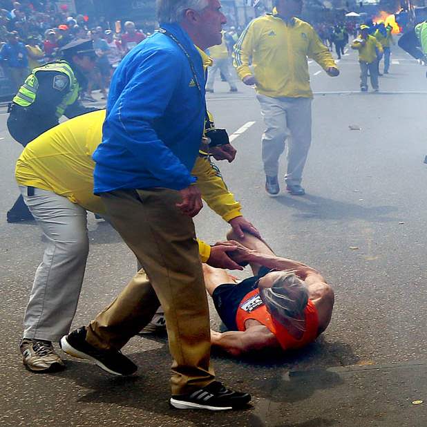 APTOPIX-Boston-Marathon-Explosions-runner-down