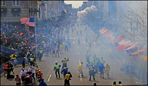 Two explosions went off today at the Boston Marathon finish line, sending authorities out on the course to carry off the injured while the stragglers were rerouted away from the smoking site of the blasts.