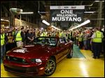  Ford's Flat Rock Assembly Plant employees cheer Wednesday as the millionth Ford Mustang is driven off the assembly line in Flat Rock, Mich. A million Mustangs have rolled off the Flat Rock assembly since production moved there in 2004. The car was built at Ford's Rouge factory for four decades before moving to Flat Rock in 2004.