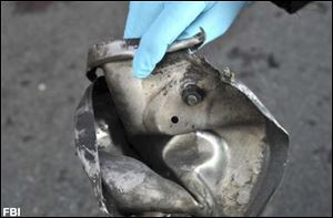 This FBI photo shows the remains of a pressure cooker that the FBI says was part of one of the bombs that exploded during the Boston Marathon. 