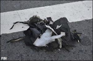 This FBI photo shows the remains of a black backpack that the FBI says contained one of the bombs that exploded during the Boston Marathon.