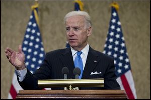 Vice President Joe Biden speaks during the dedication of a room in the Capitol Visitors Center to slain congressional staffer Gabriel Zimmerman on Capitol Hill, in Washington, Tuesday, April 16, 2013. Zimmerman died two years ago in the Tucson, Ariz., attack that critically wounded Giffords and took six lives. (AP Photo/Jose Luis Magana)