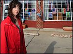  Wendy Beallas, owner of  Flag Sales and Repairs on North Summit Street in Point Place, is concerned about the difficulty of removing the paint from the 86-year-old former fire station. She wants the teenager arrested in the incident to remove the graffiti.  The business, founded by her late father, has been located in the brick structure for 14 years.