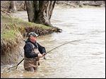  Greg Pauken of Maumee fishes close to the shoreline in the Maumee River at Side Cut Metropark. High water from recent rain adds a challenge to walleye fishing.