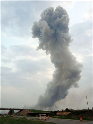 In this Wednesday photo provided by Joe Berti, a plume of smoke rises from a fertilizer plant fire near Waco, Texas.