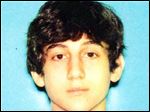  This image provided by the Boston Regional Intelligence Center shows Dzhokhar A. Tsarnaev, identified by the FBI as suspect number 2, in the Boston Marathon bombings. Authorities say Tsarnaev is still at large.