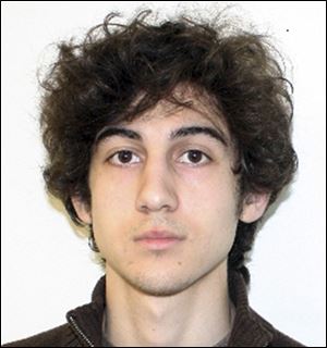 This photo released today by the Federal Bureau of Investigation shows a suspect that officials identified as Dzhokhar Tsarnaev, being sought by police in the Boston Marathon bombings Monday. 