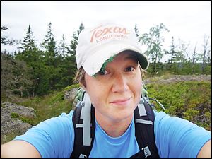 Christine O'Neil has been toting up to 45 pounds of gear on her back while using a stair-climber or hiking in Michigan's Upper Peninsula to get ready for her trek.