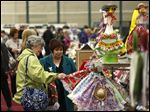 Sally Craddock, of Springfield Township, left, browsed with Judy Taube, of Sycamore, center, Saturday afternoon at the Spring Crafters Showcase at Tam-O-Shanter in Sylvania.
