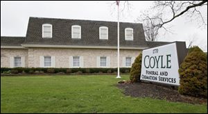 The Coyle Funeral Home on Reynolds Road in Toledo, is pictured on Tuesday, April 16, 2013.