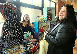 Betty Floored, left, a driving force behind the creation of Maker’s Mart, chats with Joellen Cherko of Northwood. The pop-up shop featured about 50 vendors from Ohio and Michigan.