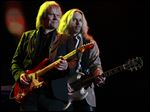  James ‘JY’ Young, left, and Tommy Shaw of Styx perform at the Huntington Center, playing to their faithful fan base. Styx was arguably the biggest draw to the megaconcert in Toledo.
