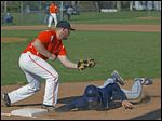  Otsego first baseman Hunter Donald tags out Lake's Jayce Vancena after a pick-off throw from Ryan Smoyer.