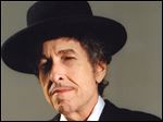  At Bowling Green State University's sparkling Stroh Center on Sunday night, Bob Dylan and his crack band cast a dark, strange spell over 90 minutes and 16 songs, sashaying through his catalog with an emphasis on his most recent album, Tempest, and his post-2000 work.