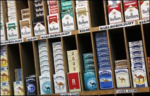 Cigarette packs could not be purchased by anyone under 21 in New York City, under the plan being considered.