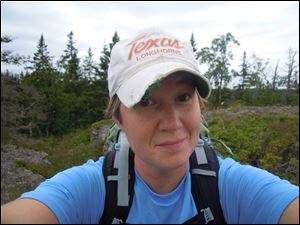 Christine O'Neil, Toledo native, St. Ursula grad, faculty member at Finlandia University in U.P.  on an expedition on Isle Royale.