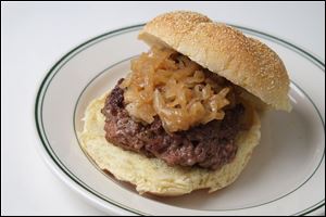Beer-braised onions on a hamburger.