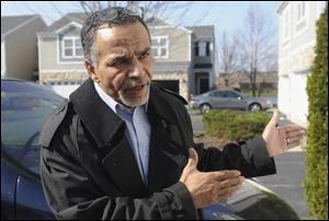 Ahmad Tounisi, whose 18-year-old son Abdella Ahmad Tounisi is charged with attempting to provide material support to terrorism, speaks to a reporter.