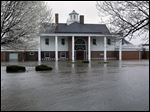  The Illinois Valley Yacht and Canoe Club is surrounded by water as the Illinois River rises out of it's banks flooding businesses and homes Tuesday, in Peoria Heights, Ill.