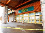 BIZ cabelas25p The doors are shuttered following a fire at Cabela's in Dundee, Wednesday,  April 24, 2013. The Blade/Andy Morrison