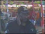  The man is described as black, with glasses, a mustache and goatee