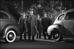 Left to right, Ryan Gosling as Sgt. Jerry Wooters, Josh Brolin as Sgt. John O'Mara, Michael Pena as Officer Navidad Ramirez, Robert Patrick as Officer Max Kennard, and Anthony Mackie as Officer Coleman Harris in 'Gangster Squad.'