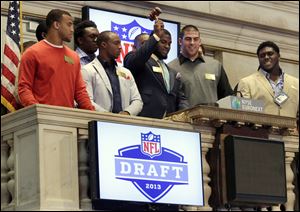 Top NFL draft prospects participated in the closing bell ceremonies Wednesday at the New York Stock Exchange. If projections hold true,  tonight could be the first time since 1953 the Big Ten didn’t have a first-round selection.