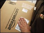  FILE - In this Oct. 18, 2010 file photo, an Amazon.com package is prepared for shipment by a United Parcel Service (UPS) driver in Palo Alto, Calif. States could force Internet retailers to collect sales taxes under a bill that overwhelmingly passed a test vote in the Senate Monday, April 22, 2013. (AP Photo/Paul Sakuma, File)