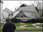  The aftermath of a possible house collapse at 1408 N. Huron St. in North Toledo.