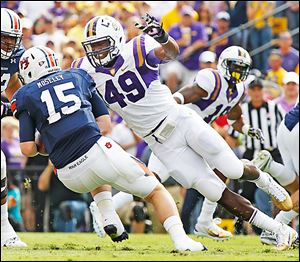 LSU defensive end Barkevious Mingo will play outside linebacker for the Browns, who are switching from a 4-3 alignment to an aggressive, 3-4 multifront scheme under new coordinator Ray Horton.