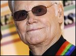   George Jones arrives for the Kennedy Center Honors at the Kennedy Center in Washington The country music mega-star passed away today at 81.