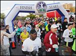  Runners in the full and half marathons start together at last year's Glass City Marathon. The 37th edition of the event takes place Sunday morning, beginning on the University of Toledo campus.