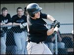  Perrysburg's Spencer George connects with the ball in the top of the fourth inning during Friday's matchup against Southview.
