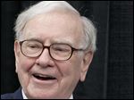  May 6, 2012, file photo,Warren Buffett, chairman and CEO of Berkshire Hathaway, plays bridge during the annual shareholders meeting in Omaha, Neb.