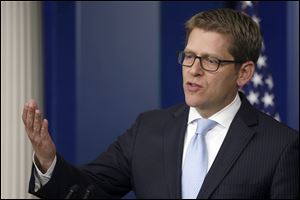 White House spokesman Jay Carney said President Obama would sign the bill, but Mr. Carney complained that the measure left the rest of the sequester intact.