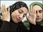  Now known as the angry and grieving mother of the Boston Marathon bombing suspects, Zubeidat Tsarnaeva is drawing increased attention after federal officials say Russian authorities intercepted her phone calls, including one in which she vaguely discussed jihad with her elder son. In another, she was recorded talking to someone in southern Russia who is under FBI investigation in an unrelated case, U.S. officials said.