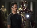  This undated publicity image released by Marvel shows Robert Downey Jr., as Tony Stark/Iron Man, in a scene from 
